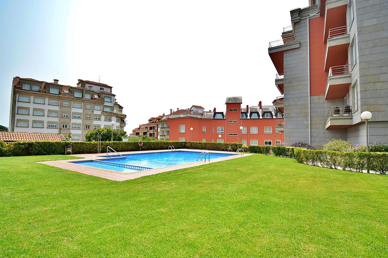 Galihost - Apartamento Con Piscina En El Centro De Sanxenxo Exteriör bild